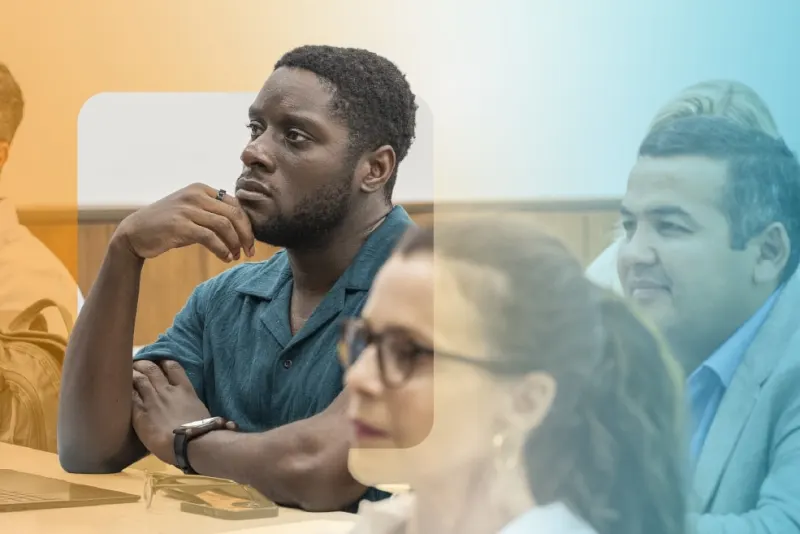 Executive MPA students collaborating around a table during class