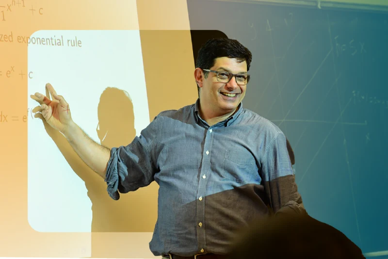Professor teaching at a blackboard in a Columbia SIPA classroom